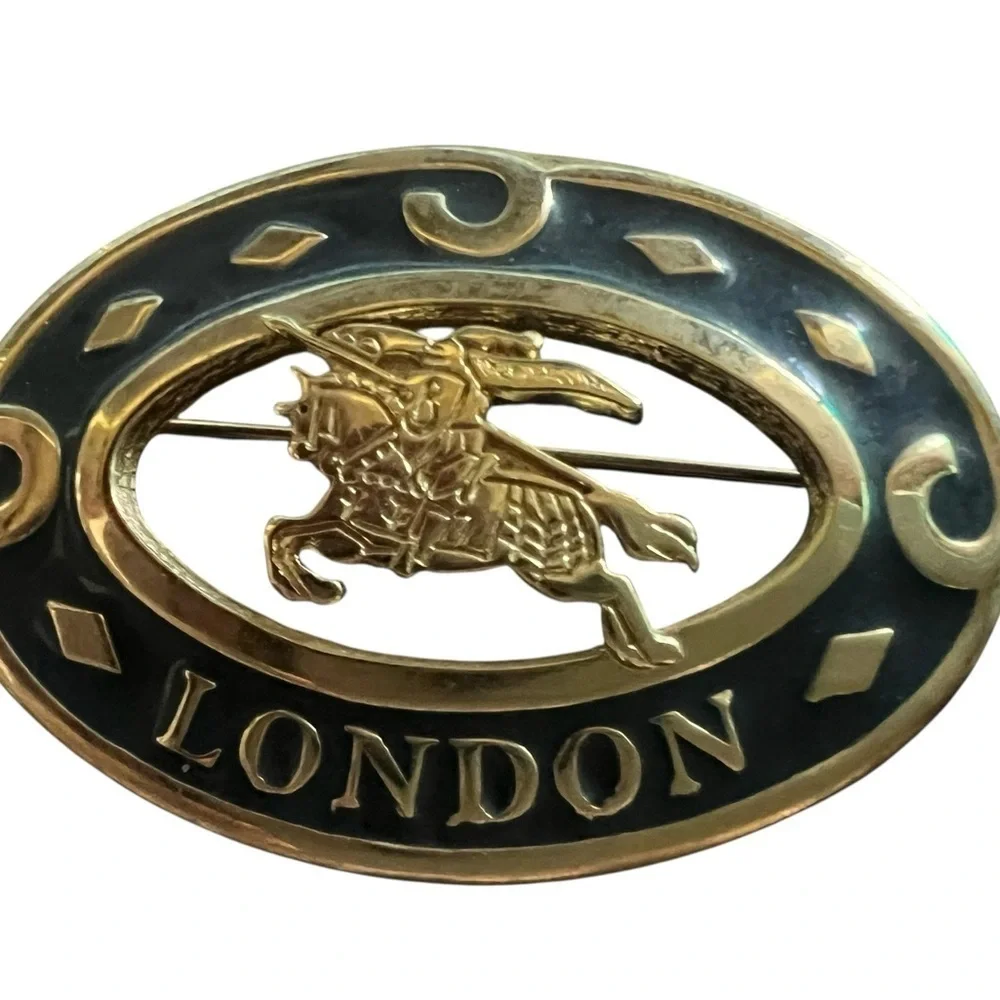 Burberry Gold and Black Brooch